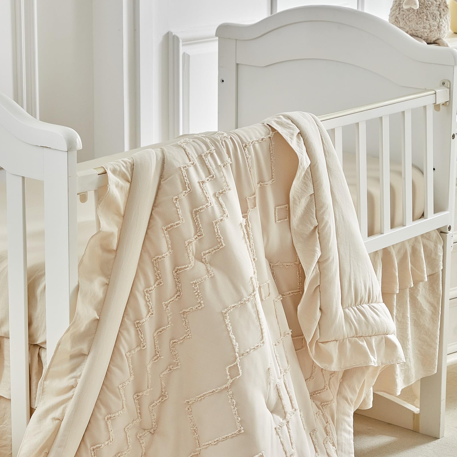 AIKASY bohemian tufted ruffles detail enhances the crib space with charm.