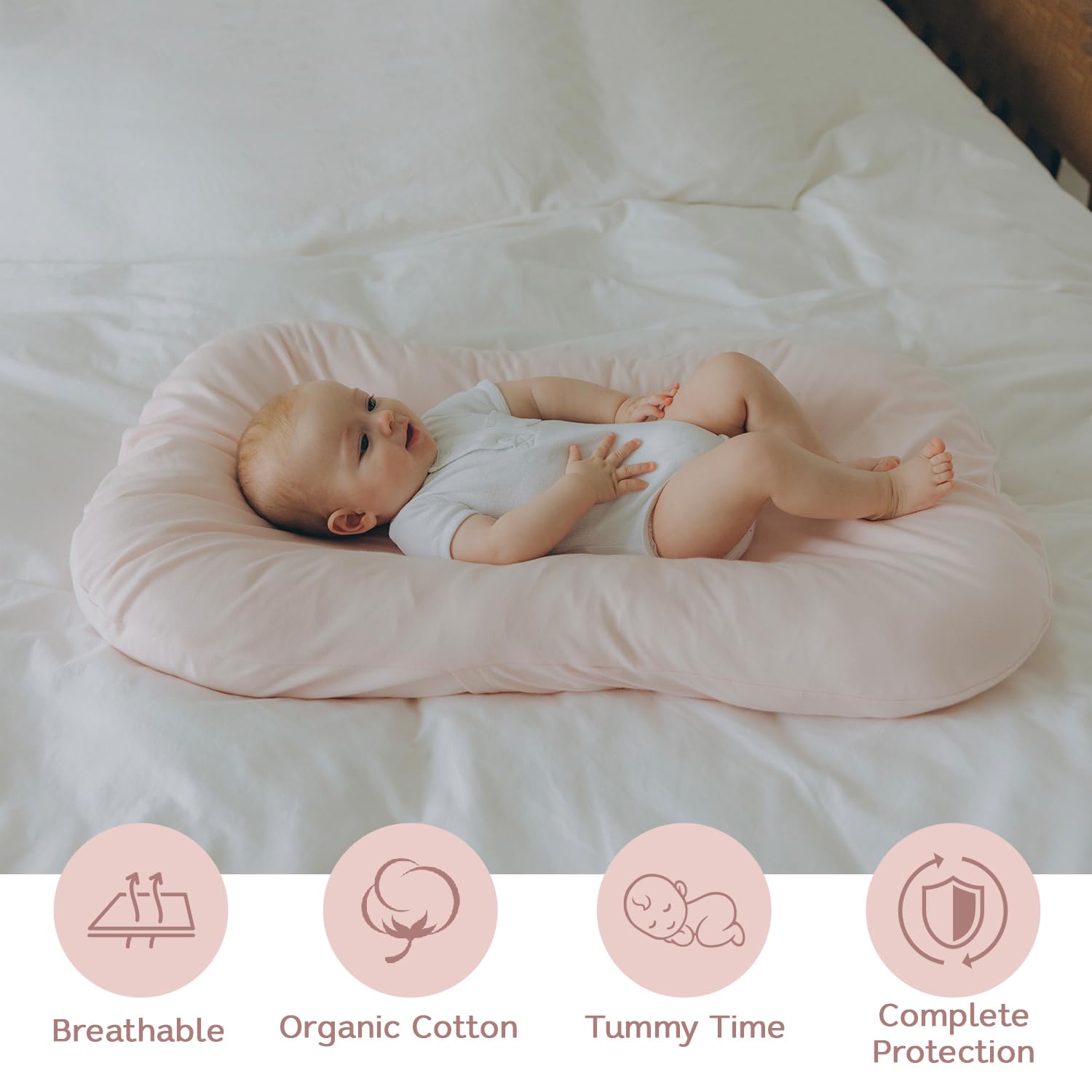 Aila + Aiden baby lounger pink for tummy-time with breathable support.