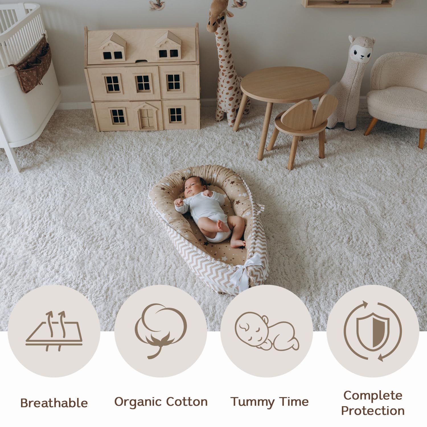 Aila+Aiden baby lounger with carry handles demonstrating travel-friendly setup.