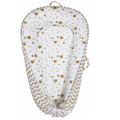 Aila+Aiden Baby Lounger cover close-up reveals soft organic cotton ideal for quick diaper changes.