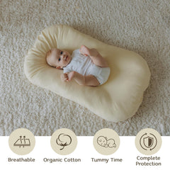 Aila + Aiden baby lounger cream cover closeup highlights soft, washable organic fabric