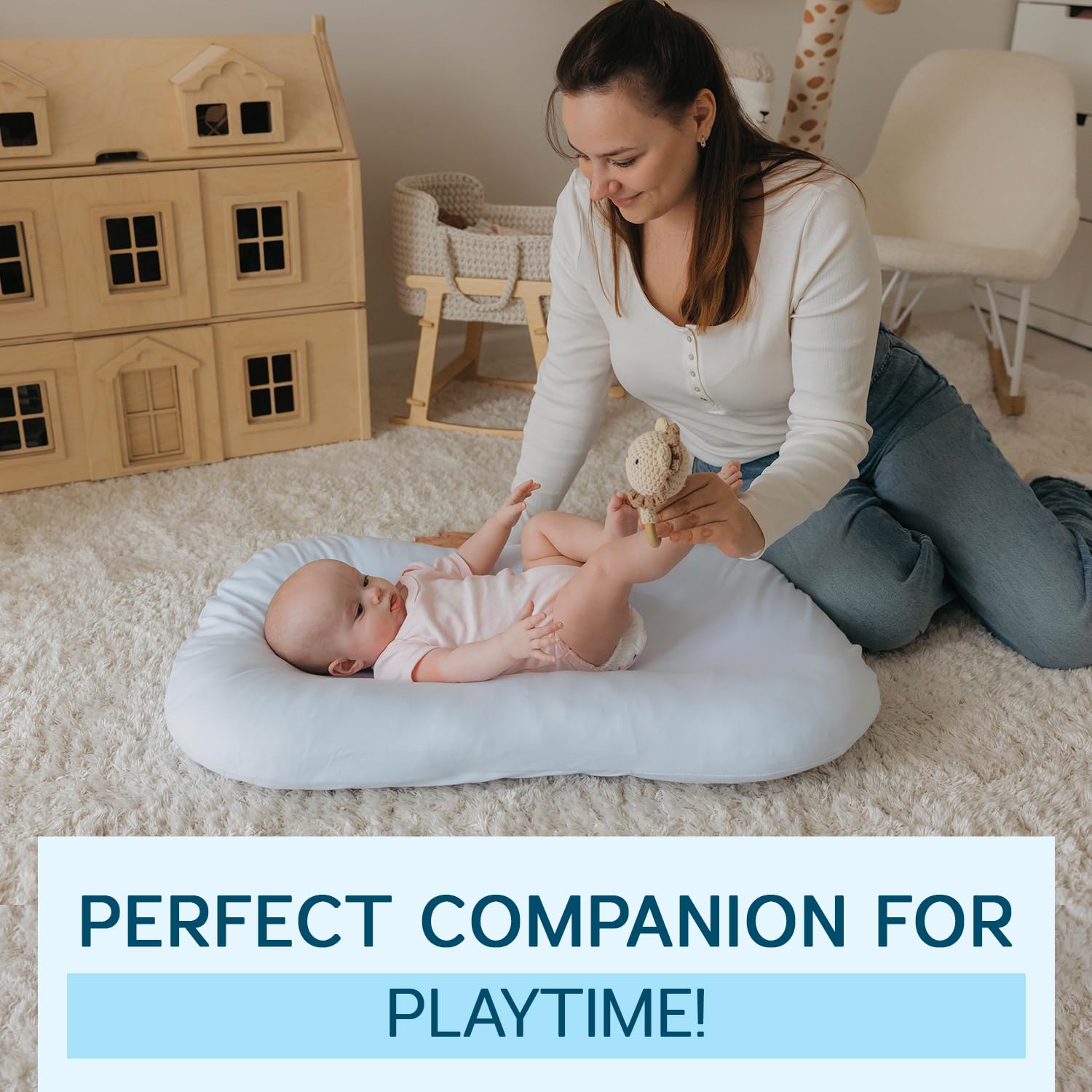 Aila + Aiden baby lounger reversible cover highlighting easy cleaning.