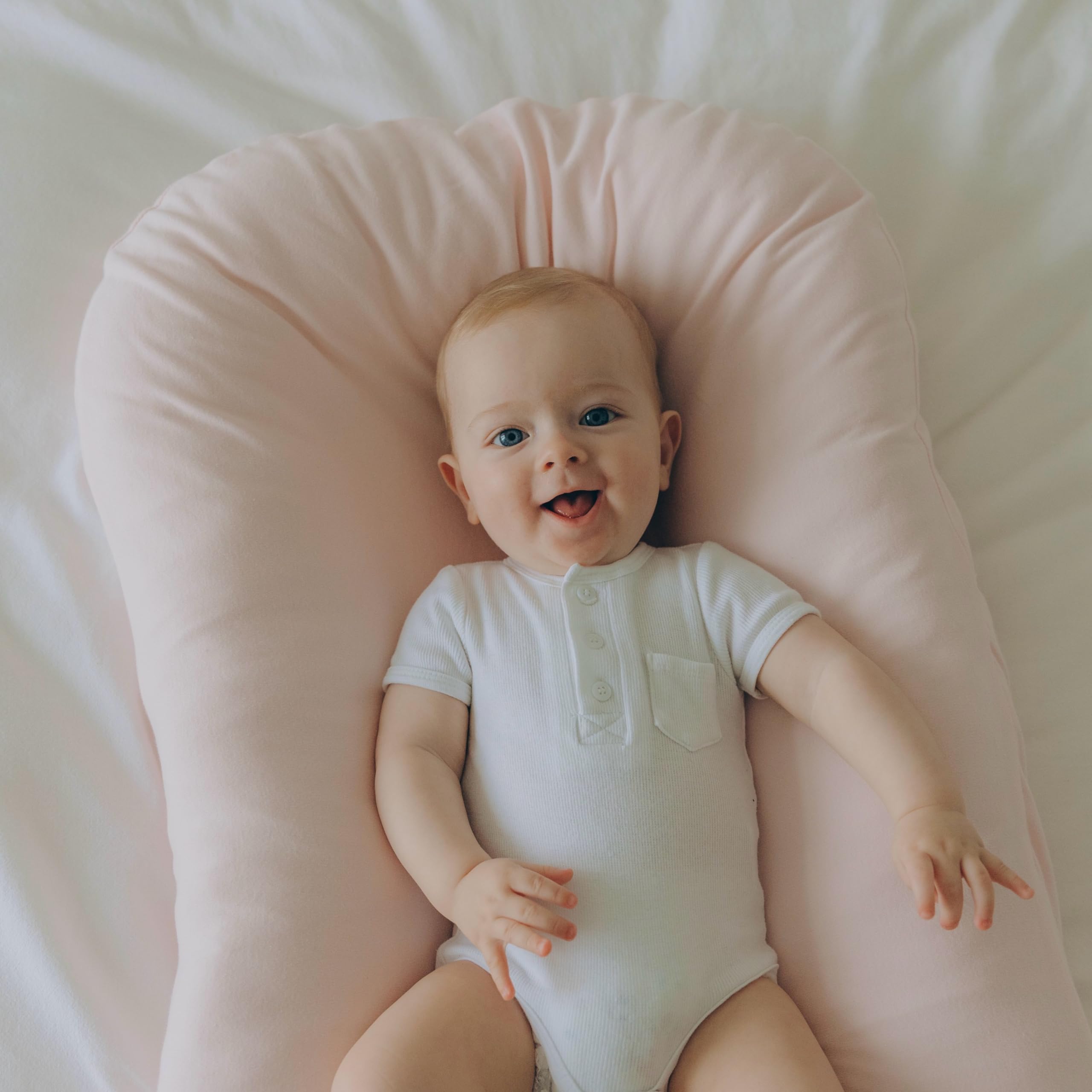 Aila + Aiden baby lounger pink safety-certified for supervised use.