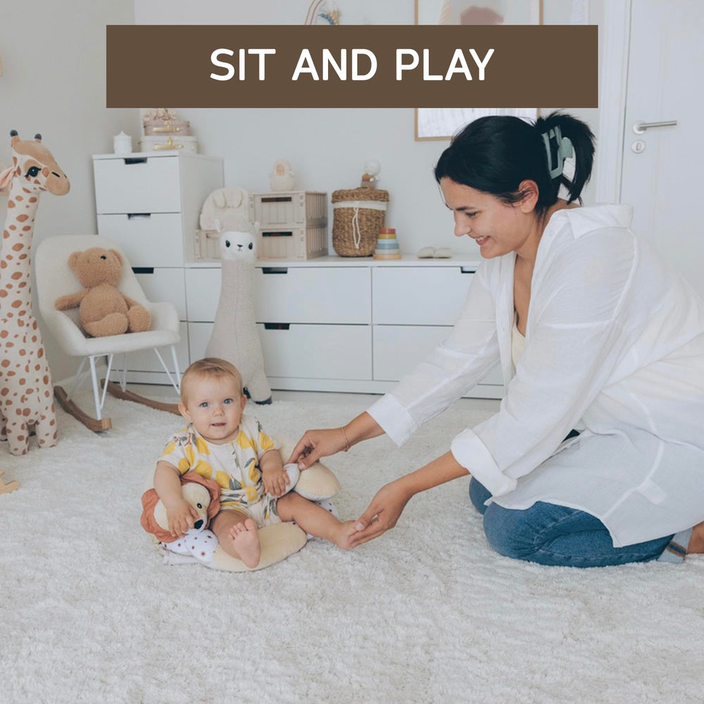 Aila+Aiden push cloth sun raddle adds visual and tactile stimulation at play.