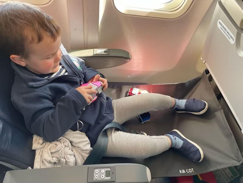 Air Cot leg-relief hammock position helps kids settle during flights