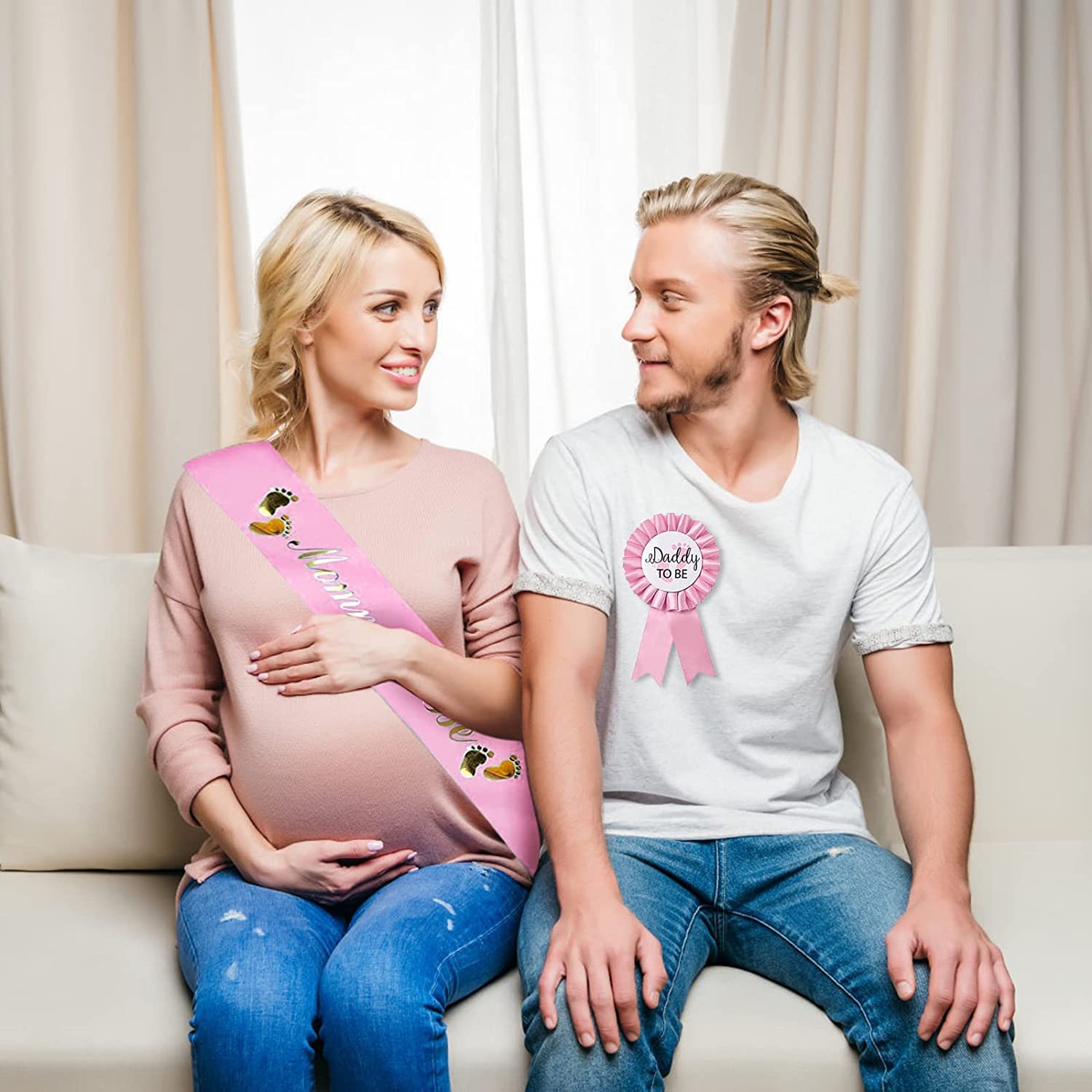 Akebrog maternity photo session with sash and badge adding celebratory flair