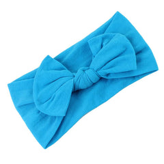 AKOAK baby headband blue elastic detail shows comfortable all-day wear.