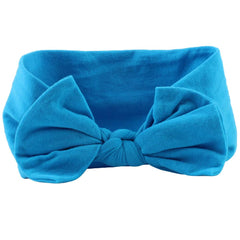 AKOAK baby headband blue close-up fabric texture and smooth finish.