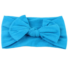 AKOAK baby headband blue front view showing soft nylon band for delicate skin.