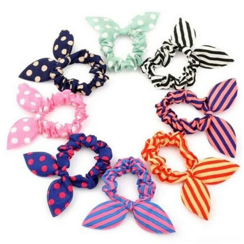 AKOAK polka dot pattern hair tie highlights playful style for everyday wear.