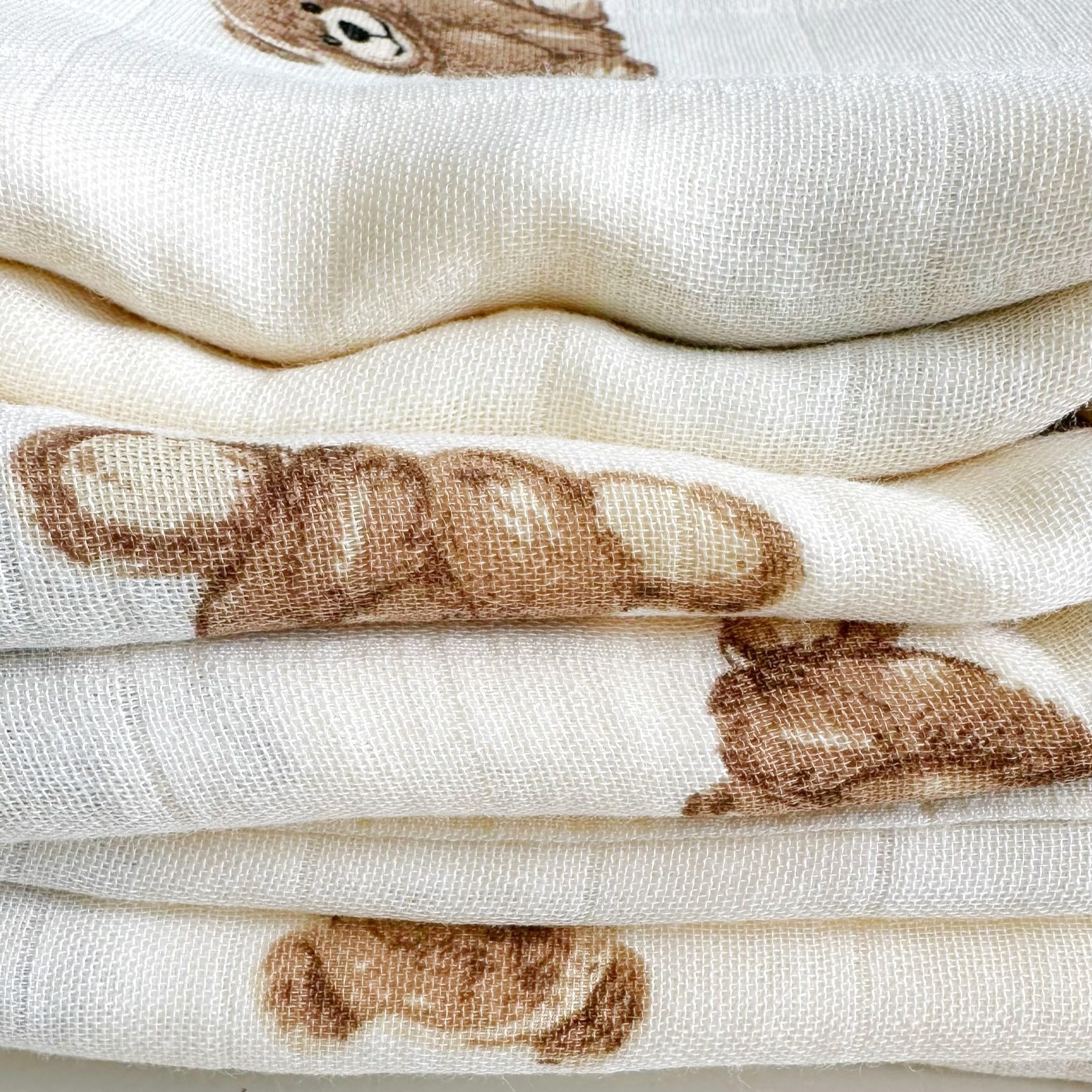Ali+Oli swaddle used as car-seat cover for shade on the go