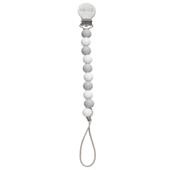 Ali+Oli pacifier clip in soft colors adds nursery organization and style.