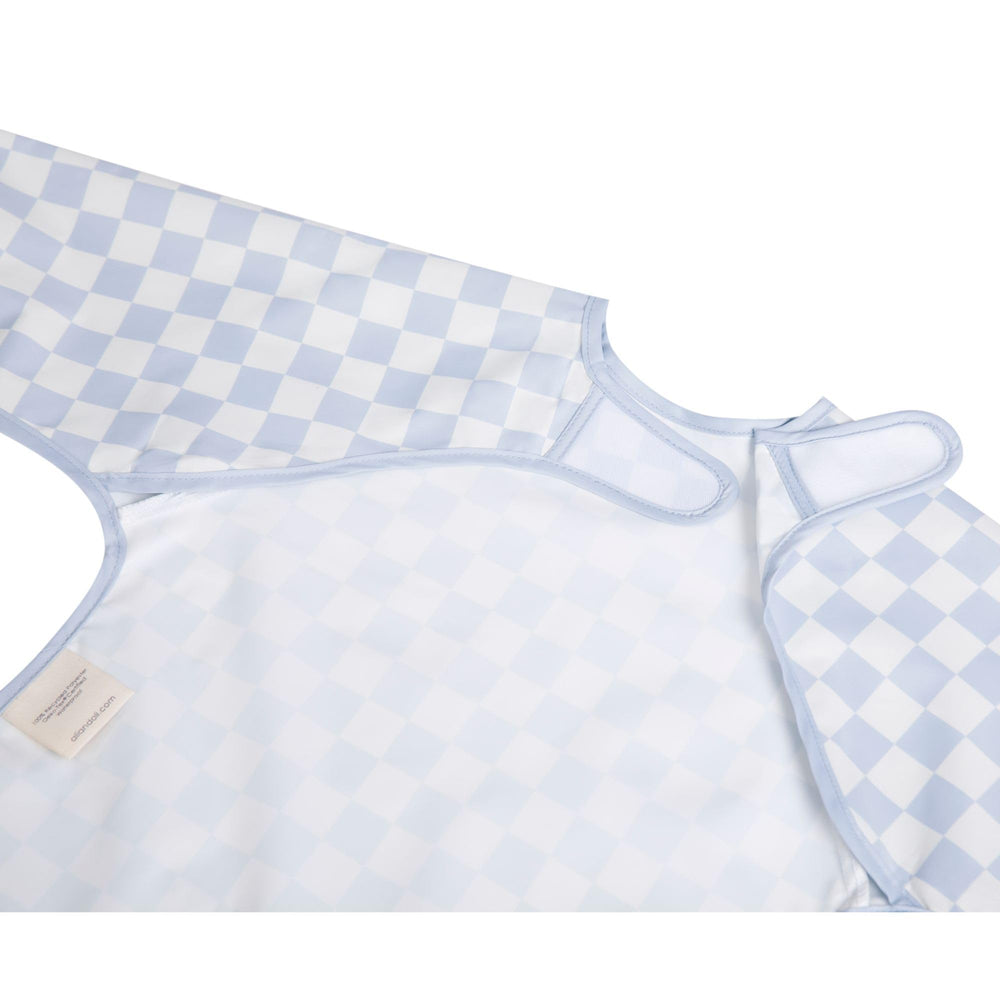 Ali+Oli Smock Bib foldable design fits a diaper bag.