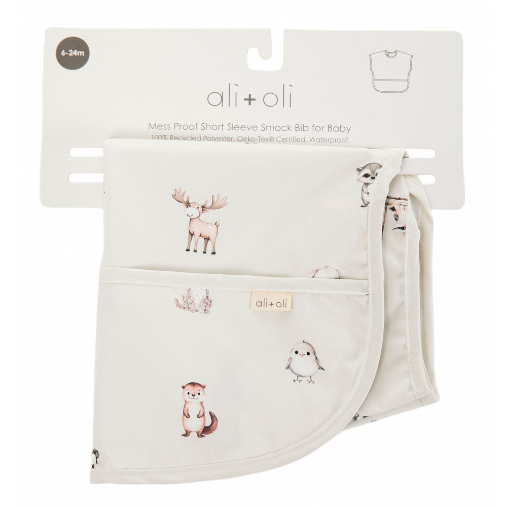Ali+Oli Smock Bib mealtime use in action illustrates spill containment