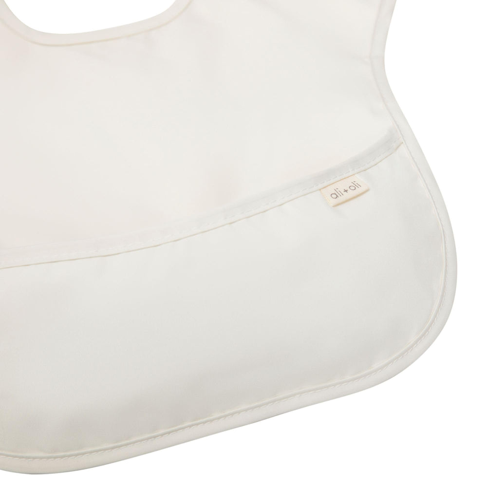 Ali+Oli Smock Bib soft neckline closeup protecting delicate skin during meals