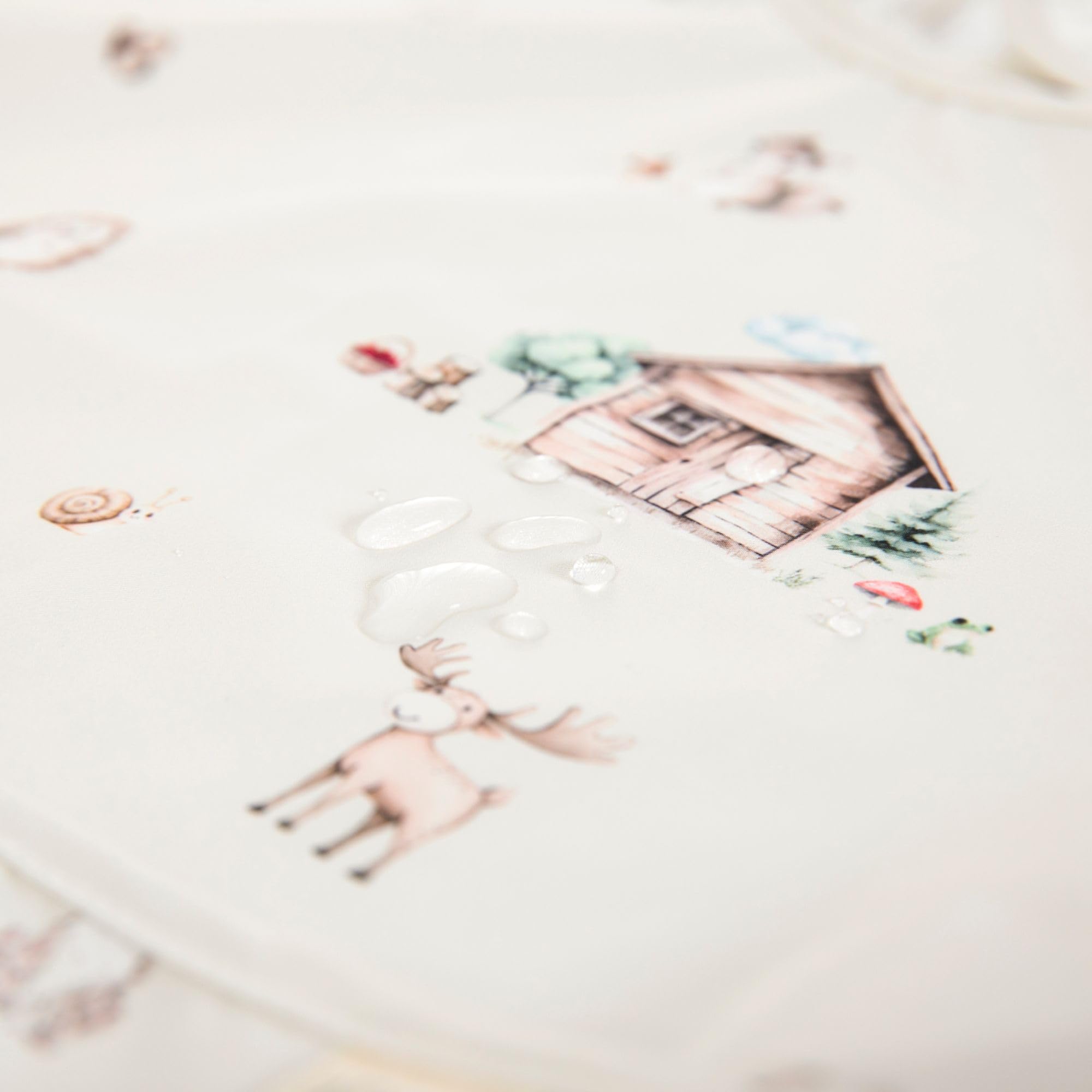 Ali+Oli Smock Bib folds compact for travel and on-the-go meals