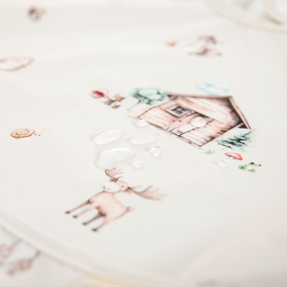 Ali+Oli Smock Bib folds compact for travel and on-the-go meals