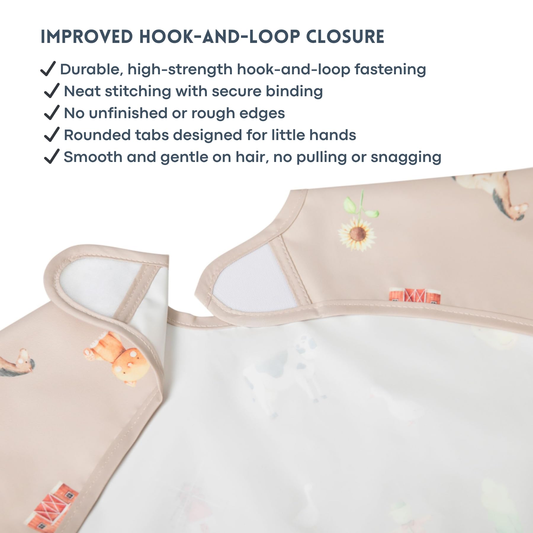 Ali+Oli Smock Bib waterproof coating closeup emphasizes wipe-clean functionality during meals