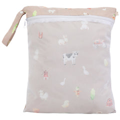 Ali+Oli wet-dry bag stroller strap demonstrates easy attachment for quick outings