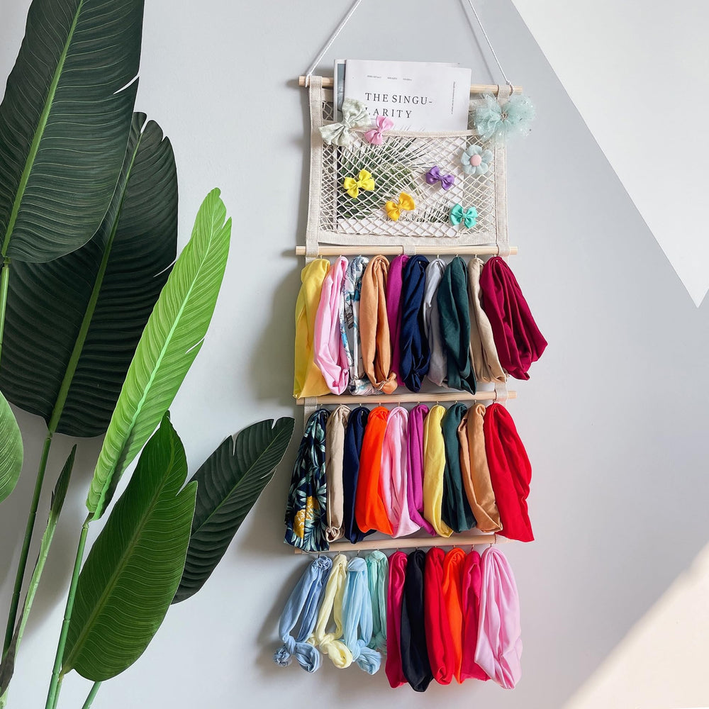 ALinmo baby bows organizer on display in a dresser