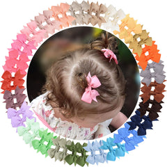 ALinmo baby hair clips side profile showing secure 2-inch bows for daily wear.
