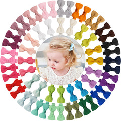 ALinmo baby hair clips 60-piece set with 2-inch bows for easy, colorful pigtail styling.