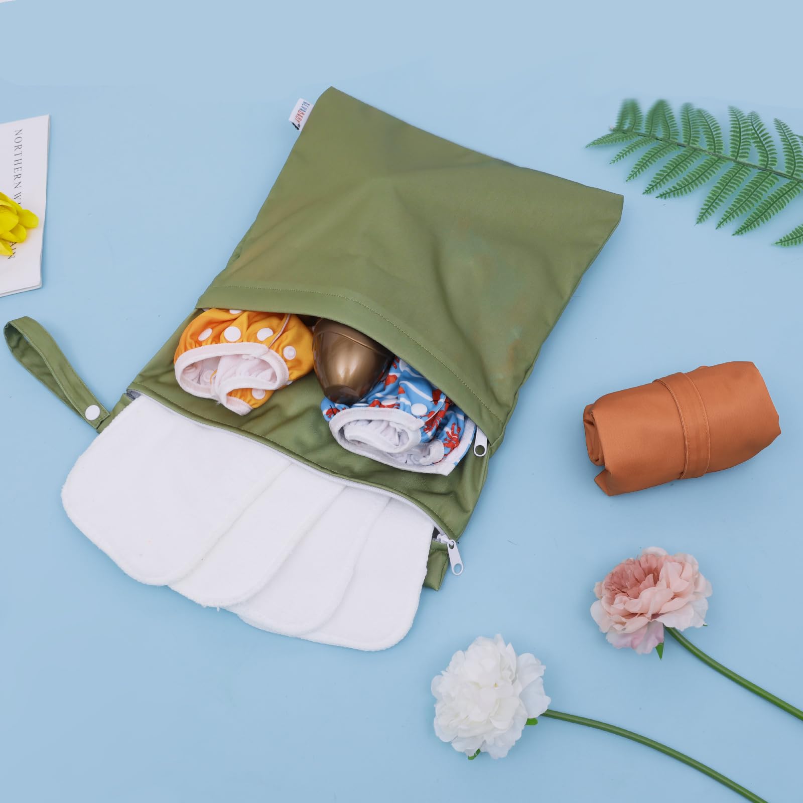 ALVABABY bag with sturdy handle attaches to a diaper bag or stroller.