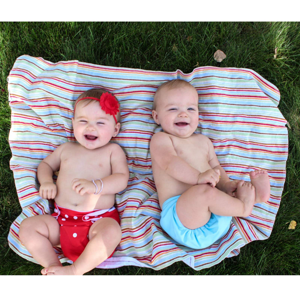 ALVABABY hip and crossover snaps—secure fit prevents wing droop.