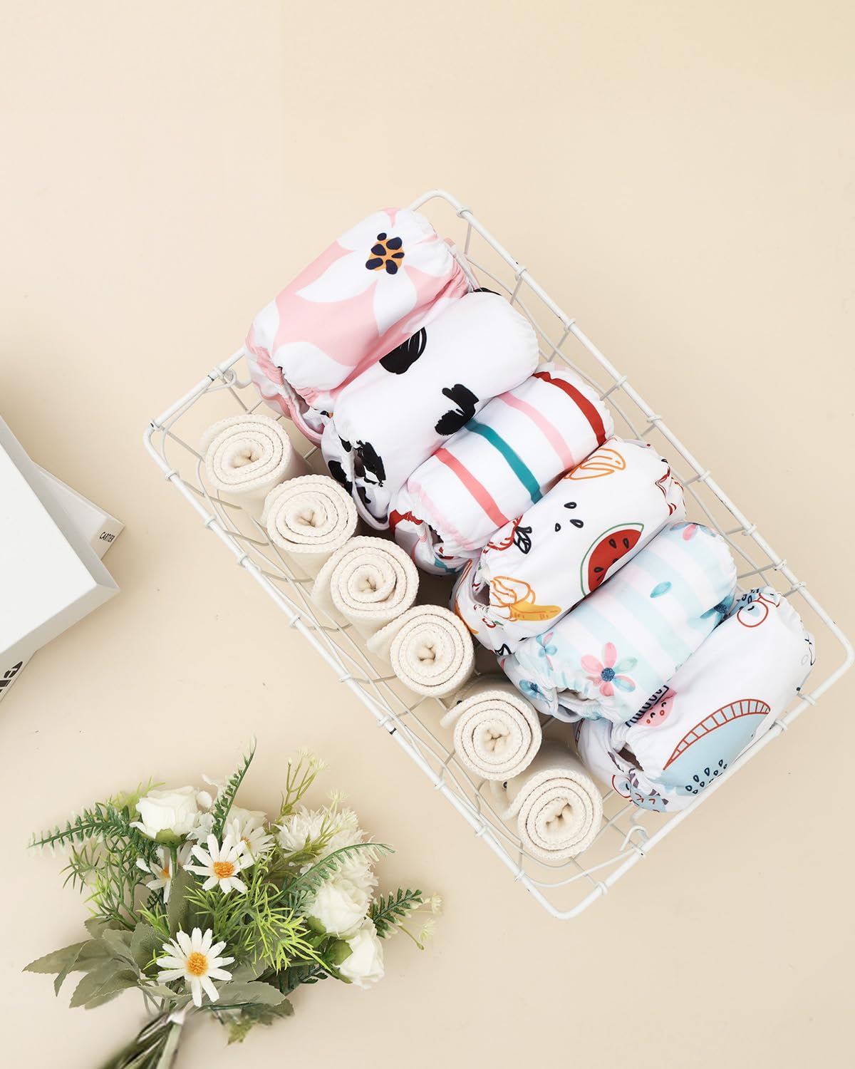ALVABABY newborn diaper set packaging shows 6 covers and 12 inserts.
