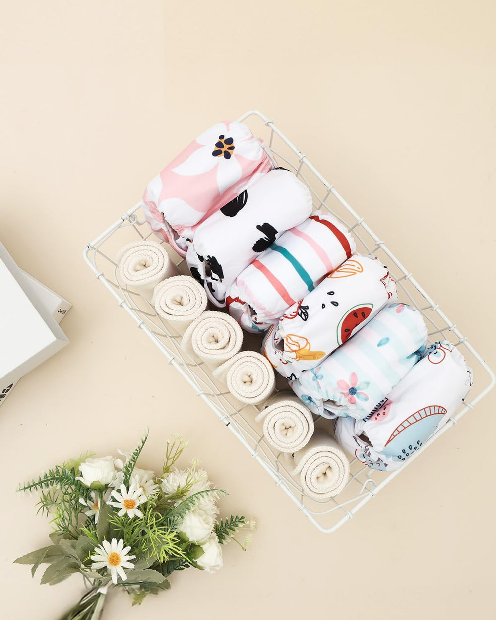 ALVABABY newborn diaper set packaging shows 6 covers and 12 inserts.