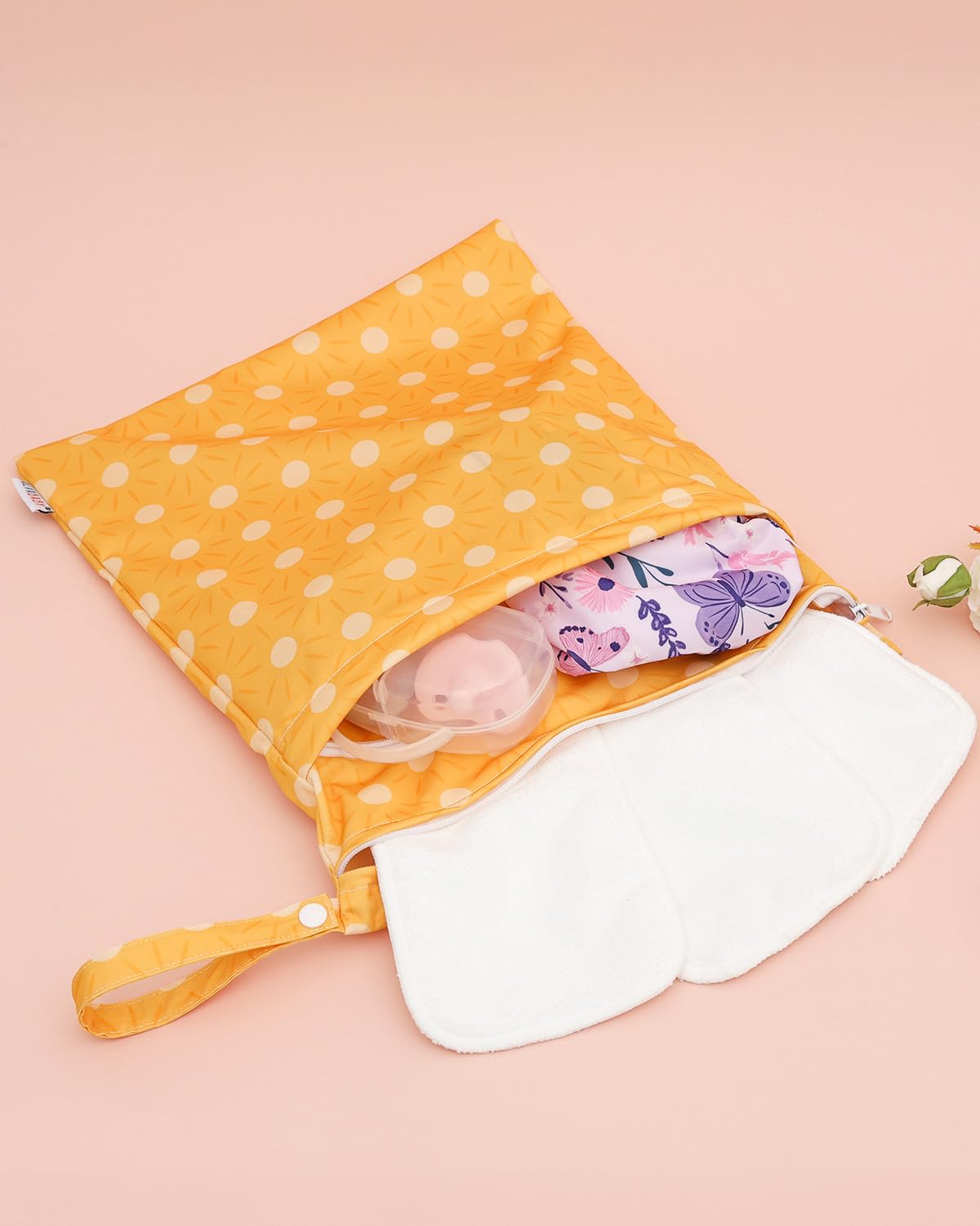 ALVABABY wet dry bag care wash image showing machine washable fabric