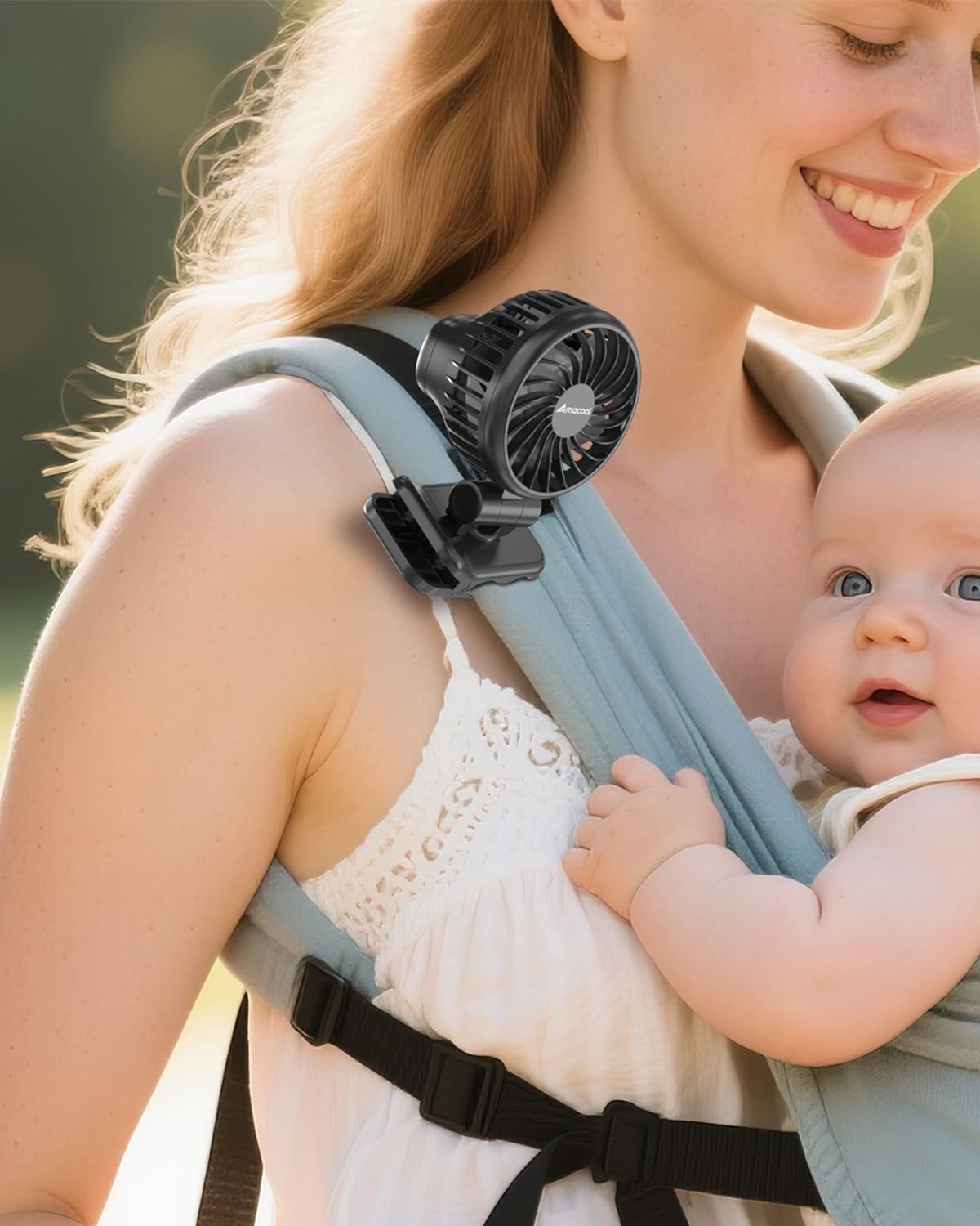 AMACOOL mini baby clip fan securely clipped for hands-free cooling on the go