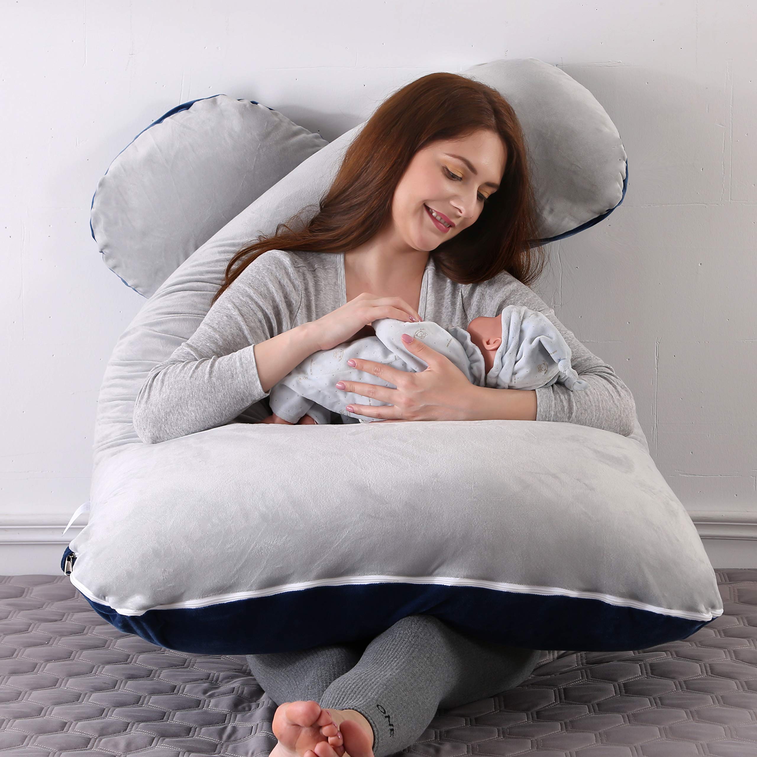 Amagoing pillow designed for leg back and belly support during pregnancy.