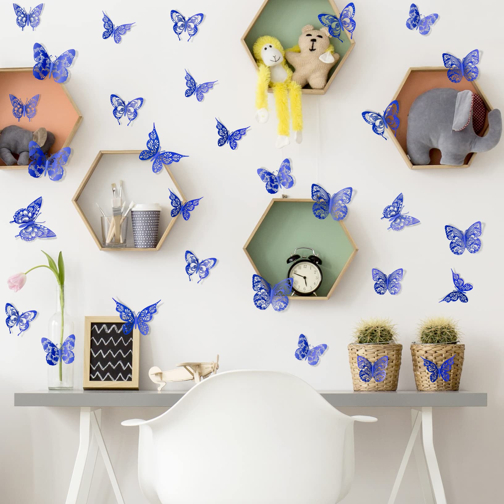 Amaonm 3D butterfly wall decor application blue shows easy press-on placement with dots.