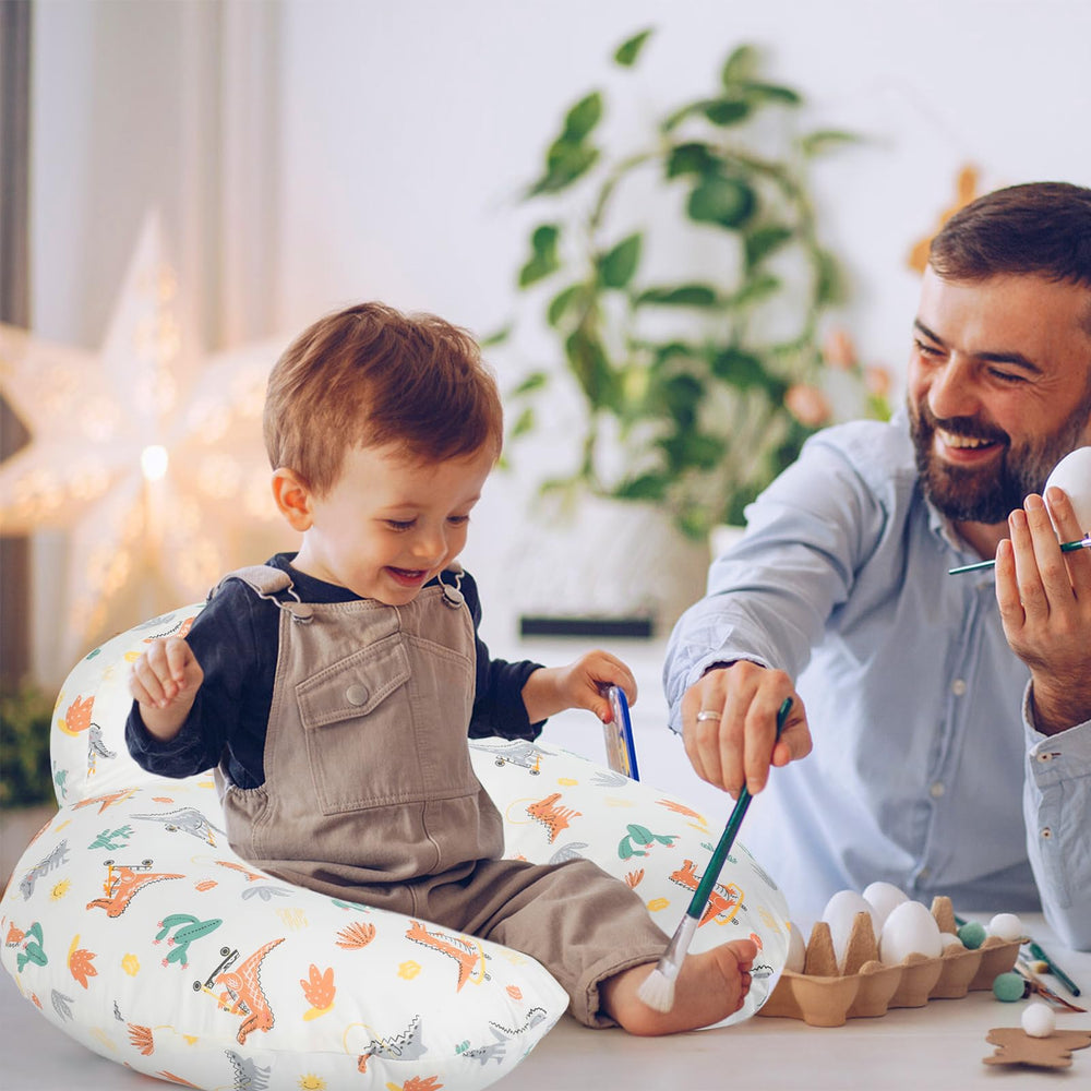 AMASKY Nursing Pillow in use during feeding demonstrates hands-free multitasking potential