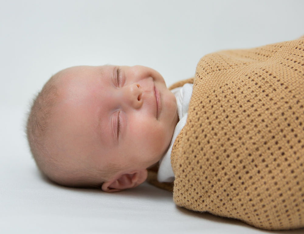 Amazing Baby cellular blanket baby nap time scene emphasizes gentle warmth and breathability.