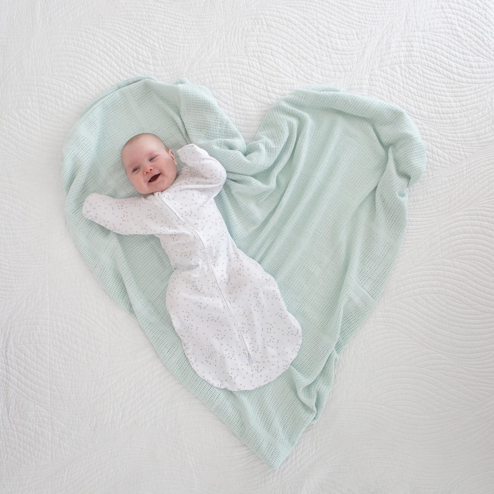 Amazing Baby cellular blanket baby sleep setup demonstrates breathable knit for comfortable nights.