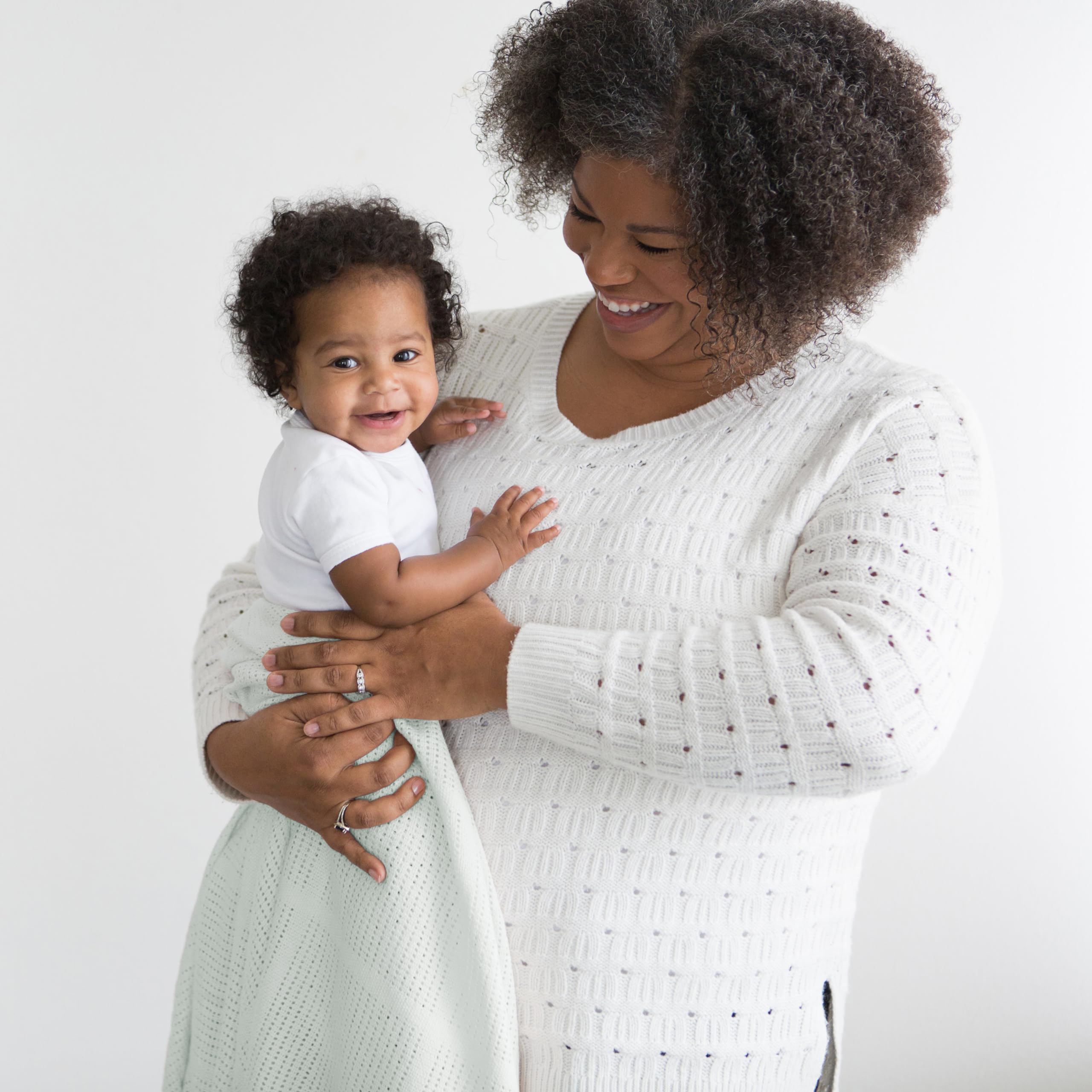 Amazing Baby cellular blanket breathable knit texture highlights lightweight warmth for year round use.