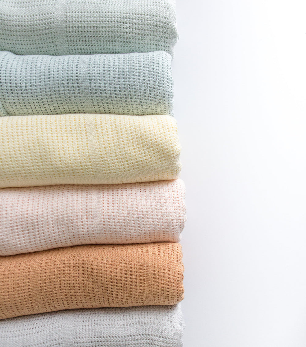Amazing Baby cellular blanket soft pink color adds gentle nursery style and comfort.