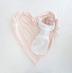 Amazing Baby cellular blanket swaddle use demonstrates ideal wrap for cooler environments.