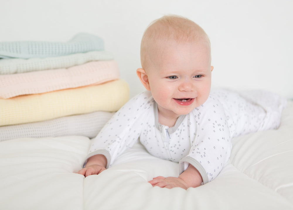 Amazing Baby machine-washable cotton blanket simplifies care without sacrificing softness.