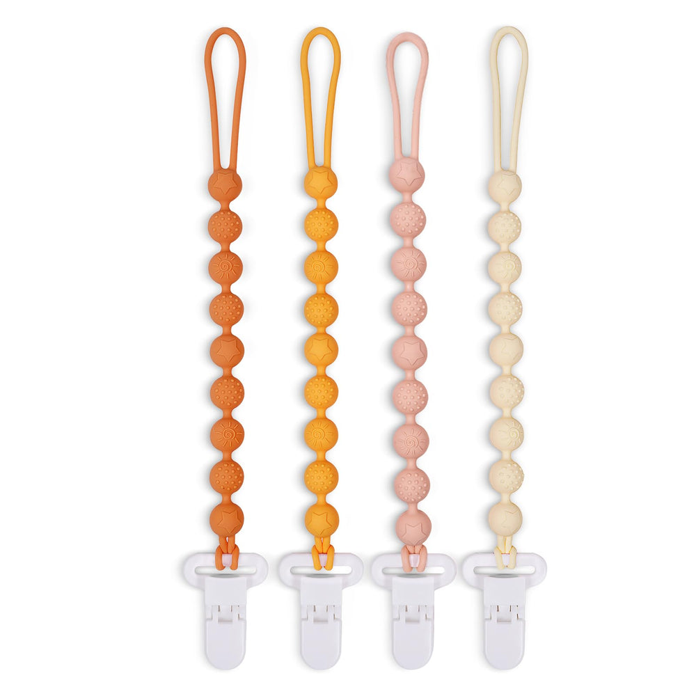 AmazingM brown pacifier clip shows textured surface for tactile soothing.