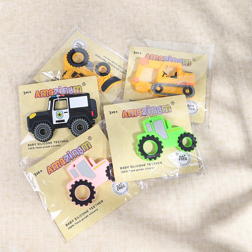 AmazingM tractor pink teether shown as gift-ready set.
