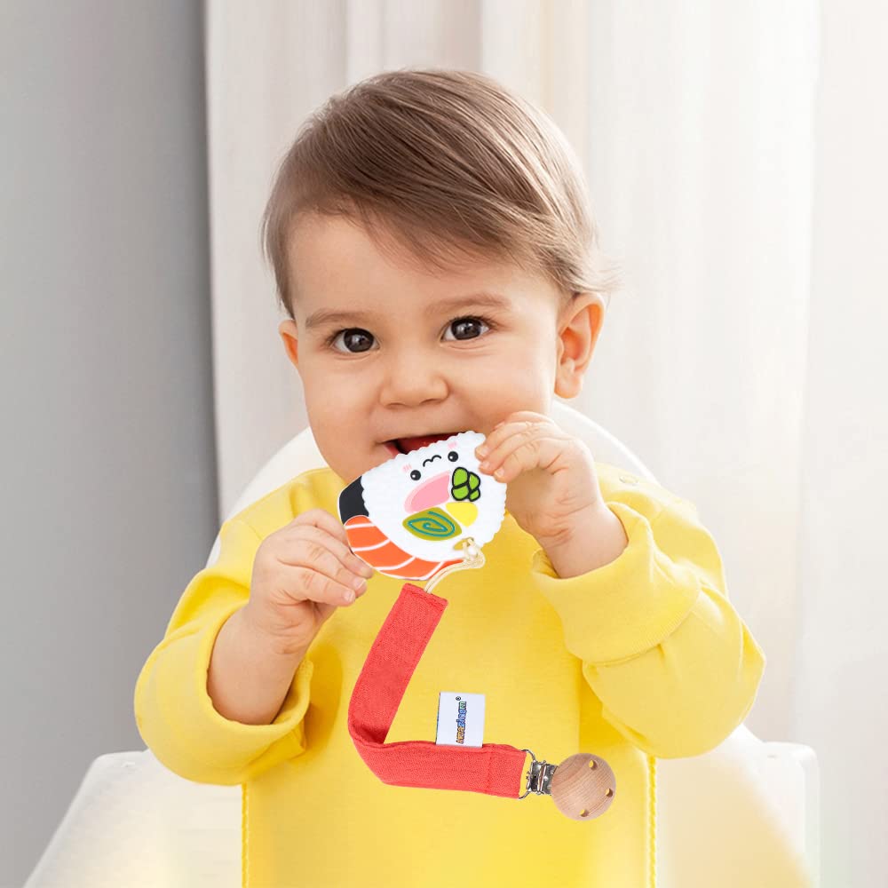 AmazingM pacifier clip on baby clothes demo demonstrating secure clipping.