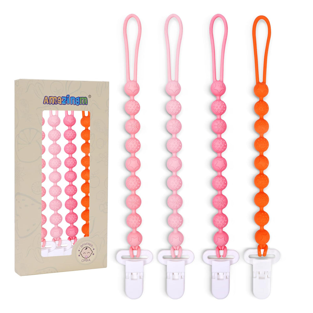 AmazingM pink silicone teething clip closeup showing one-piece design for safe use