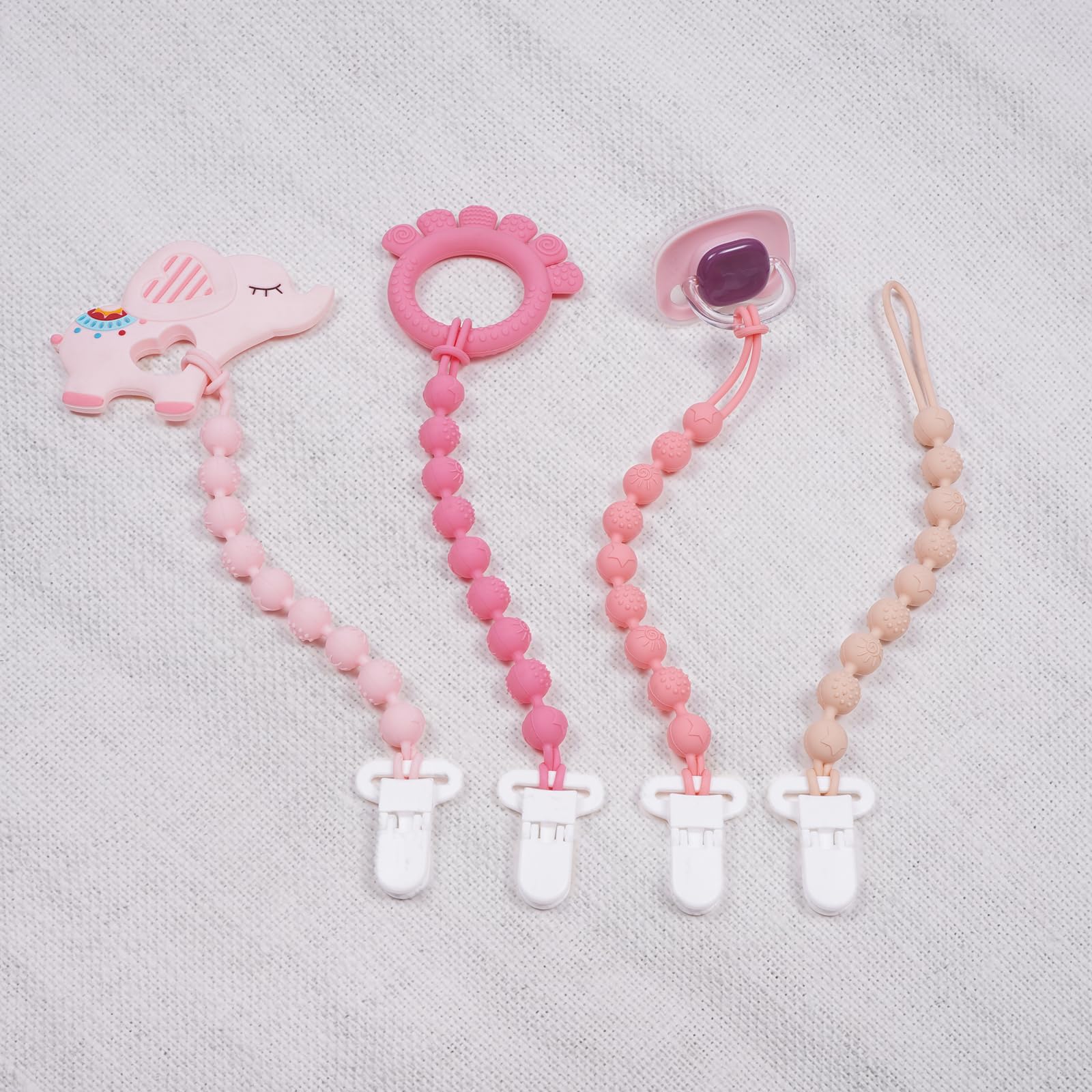 AmazingM teether clip mounted on a car seat for on the go
