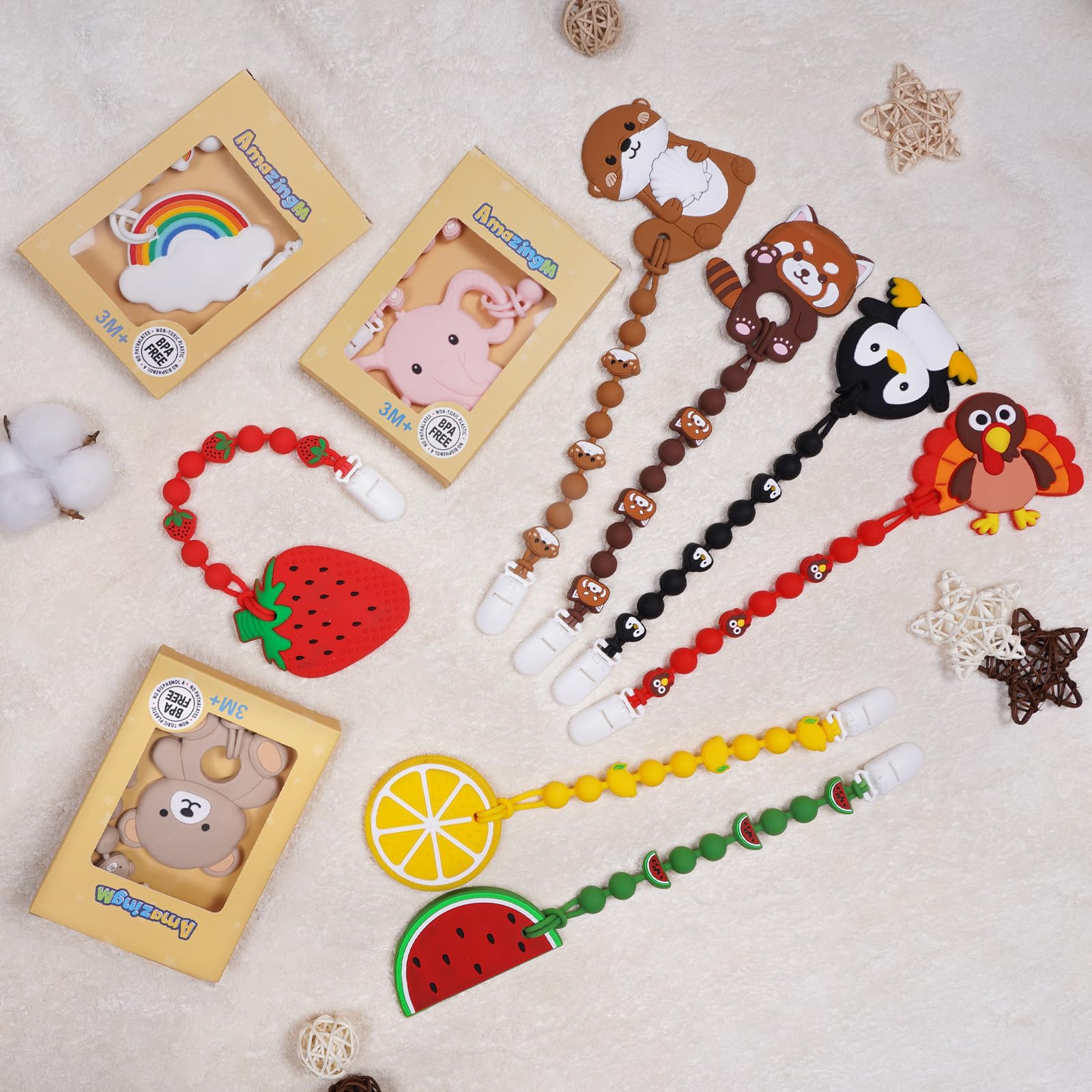 AmazingM teether in baby hand showcases easy-grasp shape for little fingers.