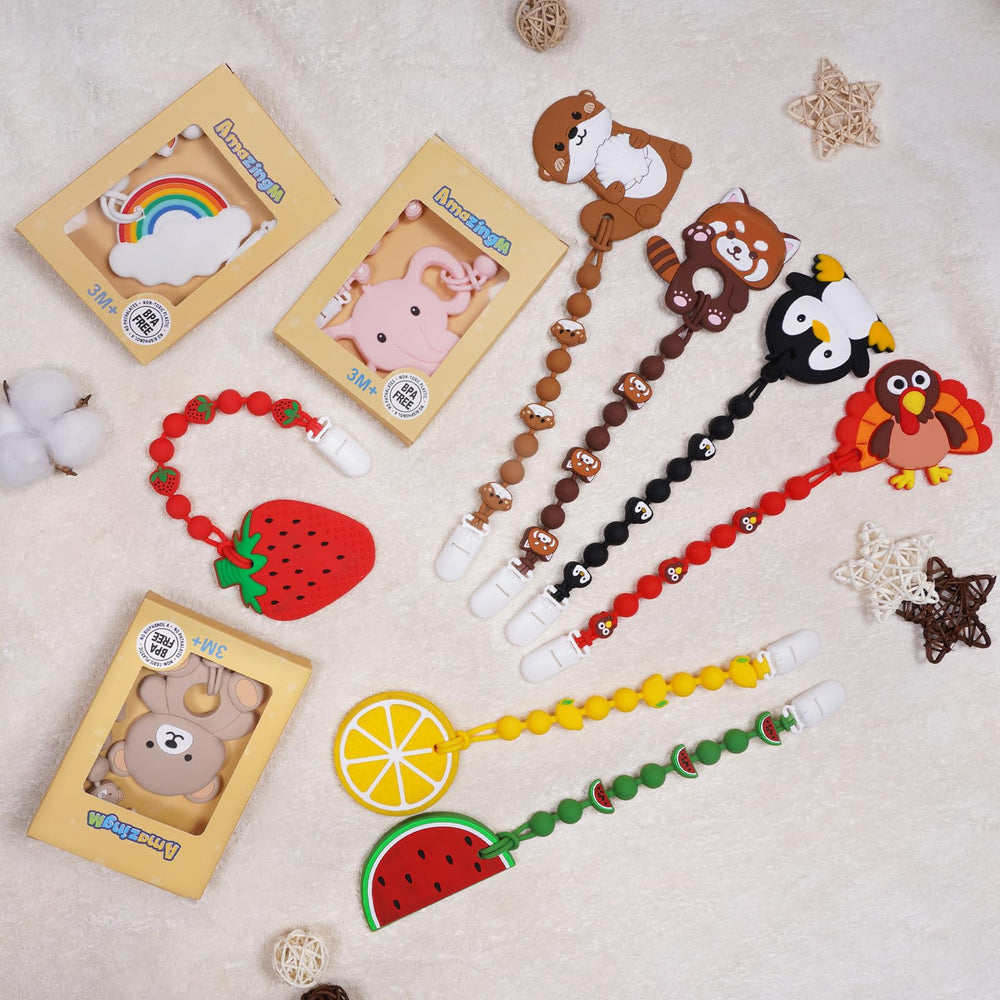 AmazingM teether in baby hand showcases easy-grasp shape for little fingers.