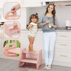 AMBIRD bamboo two-step stool pink side handles emphasize grip and ease.