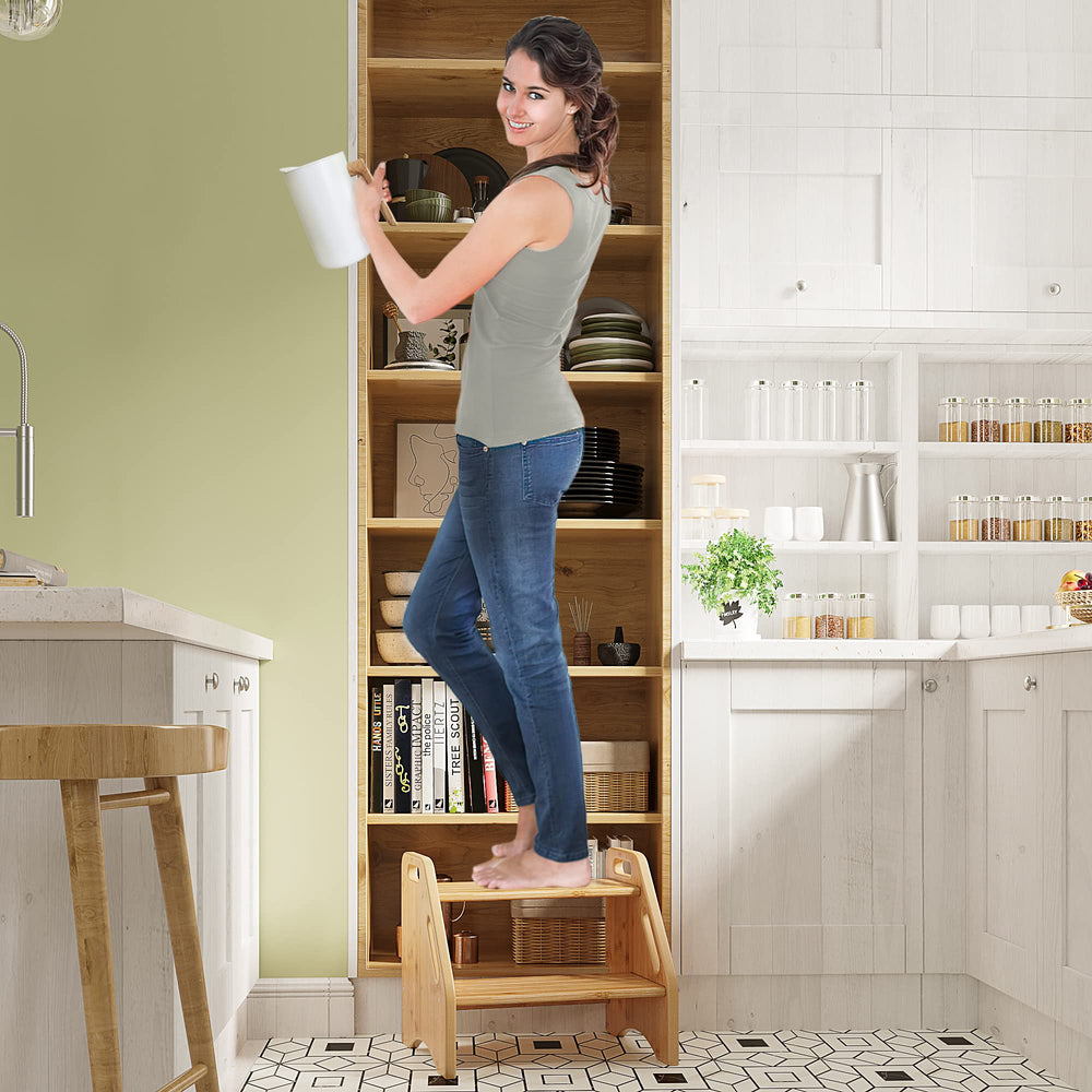 AMBIRD Wooden Step Stool handrails image communicates extra support for independence